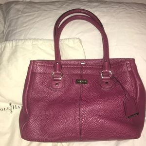 Deep Cranberry coloured and fabulous inside/  out